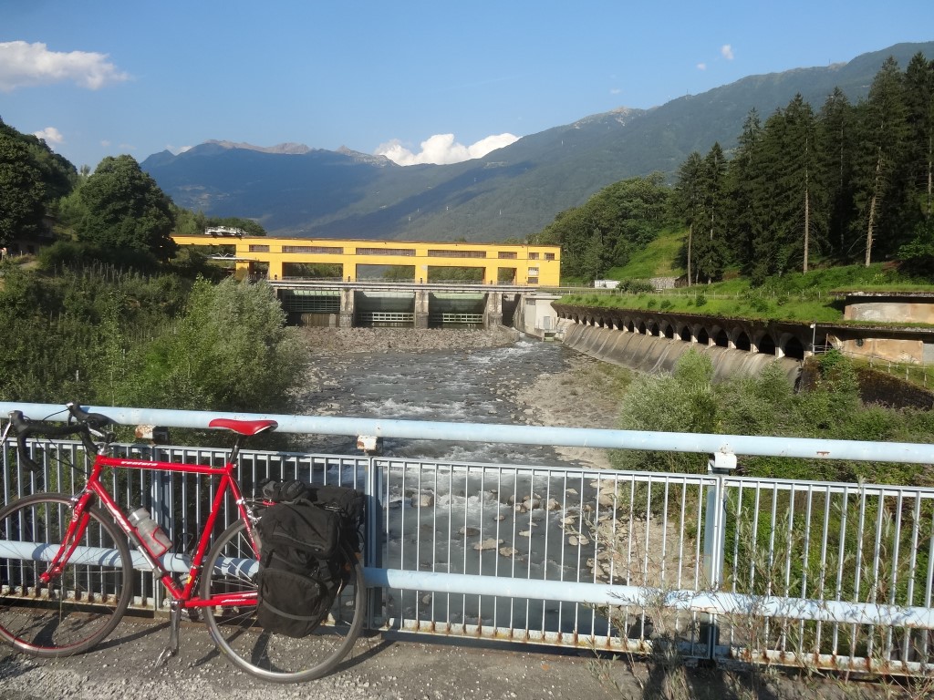 Low head hydropower generation facility as part of travel-by-bike trip